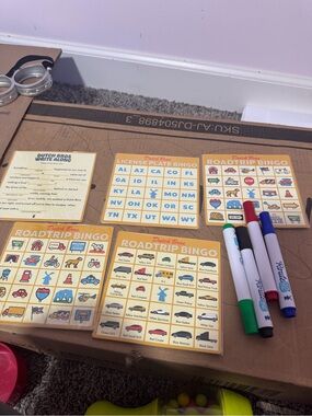 Dutch Bros Yellow Roadtrip Bingo Cards with Red Blue Green Black Markers